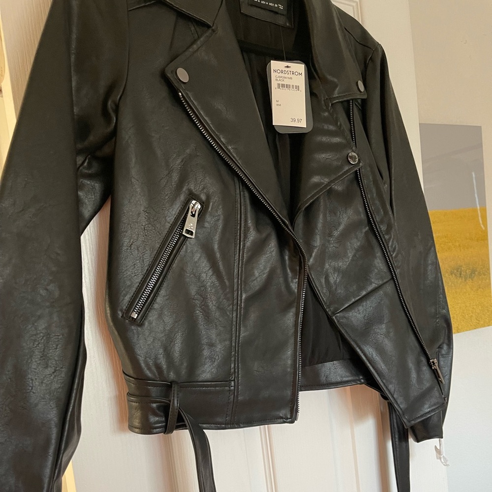 Black faux leather jacket with tags!